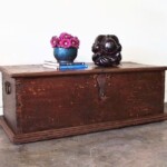 Original cast iron hardware throughout the piece adds to it's authentic beauty. Old Teak Chest Trunk from Java
