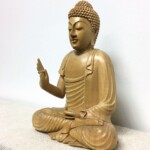 Small Hand Carved Bali Buddha Statue at Gado Gado Small Hand Carved Bali Buddha Statue at Gado Gado