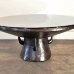 Round Coffee Table with Unique Wood Base from Gado Gado Round Coffee Table with Unique Wood Base