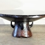 Round Coffee Table with Unique Wood Base Round Coffee Table with Unique Wood Base from Gado Gado