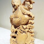Hand Carved Happy Buddha Wood Statue from Bali Hand Carved Happy Buddha Wood Statue from Bali