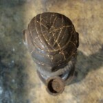 Man with Snake Tribal Statue