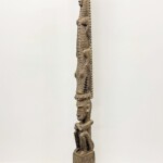 Tall Carved Tribal Wood Art Statue at Gado Gado