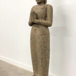 Tall Carved Stone Standing Buddha Statue at Gado Gado