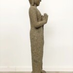 Tall Carved Stone Standing Buddha Statue at Gado Gado