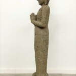 Tall Carved Stone Standing Buddha Statue at Gado Gado